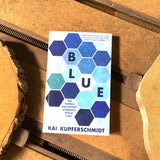 Blue: The Science and Secrets of Nature's Rarest Color by Kai Kupferschmidt